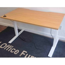 Light oak 1200mm by 600mm electric height adjustable straight desks Light oak 1200mm by 600mm electric height adjustable straight desks