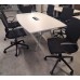 White 2000mm by 1200mm in middle by 1000mm at ends meeting room table