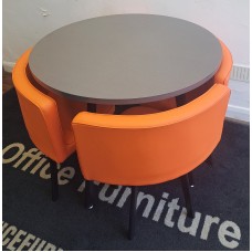 Graphite grey 900mm wide table set with four orange faux leather chairs