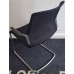 Black mesh meeting chairs with arms